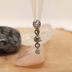 LeRoi Zen Navel Curve 12G (2.0mm) met glanzende kristallen.